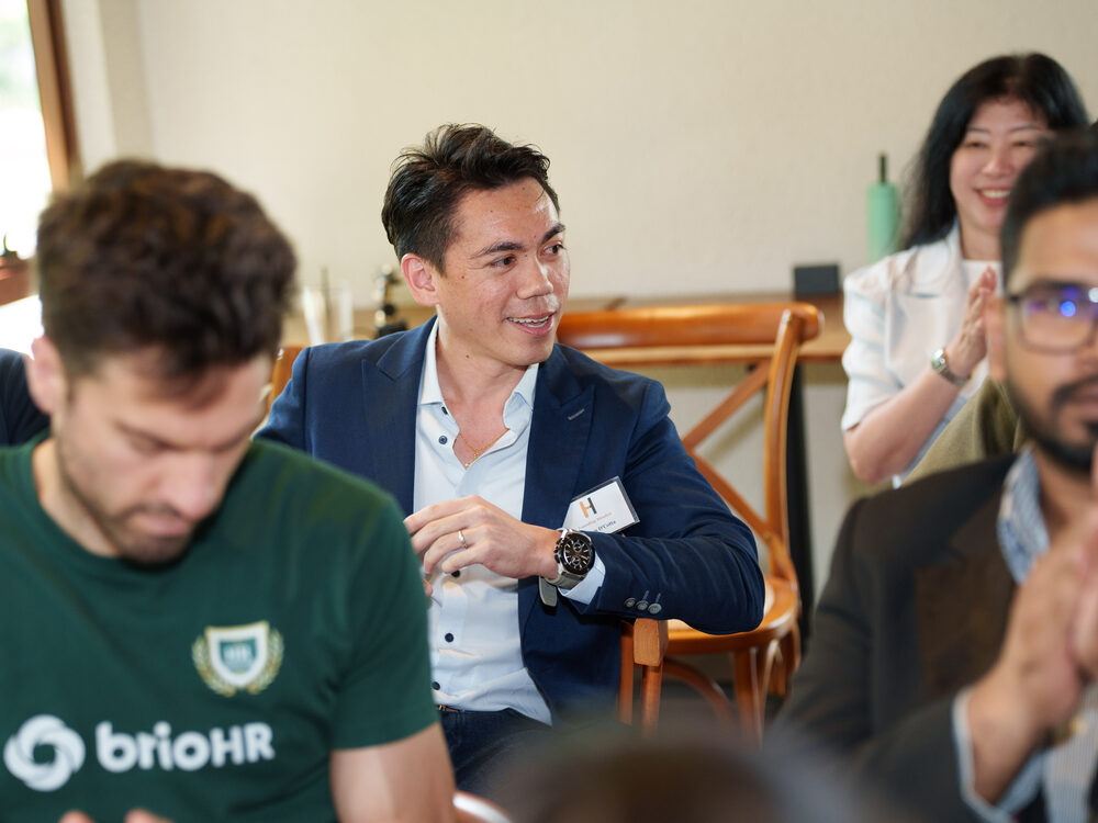 Members laughing during a discussion